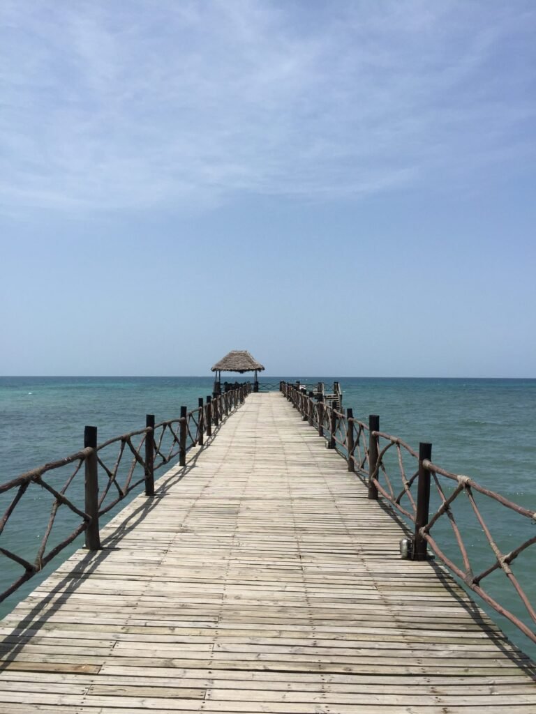 A wooden jetty leading out over the sea in Zanzibar