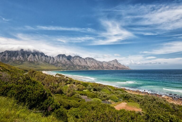 The coastline of the Garden Route with mountains behind