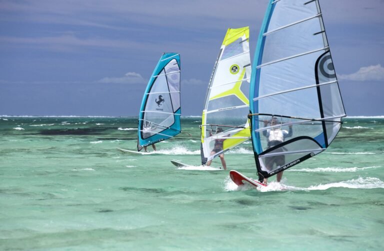 Windsurfers on a turquoise lagoon in Mauritius